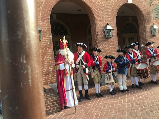 St. Nick with fife and drum corp